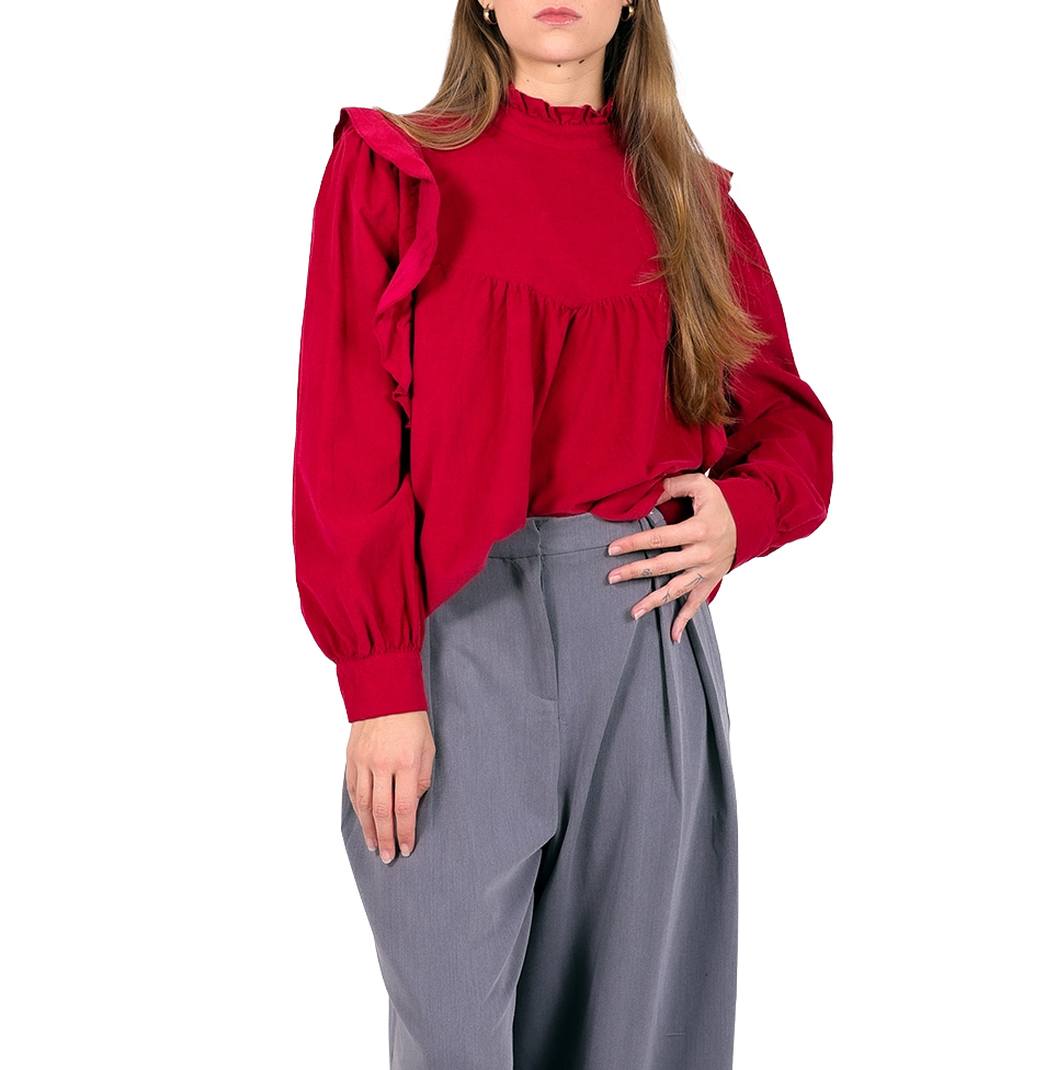 Blusa de micropana con volantes